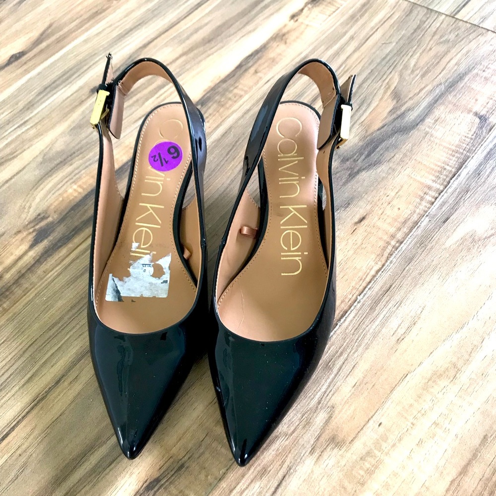 Shiny black elegant shoes.